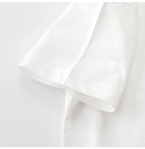 Close-up of double-needle flat stitching on high-quality white cotton t-shirt sleeve