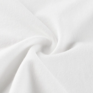Close-up of white soft cotton knit fabric texture with flexible drape for boys' T-shirts