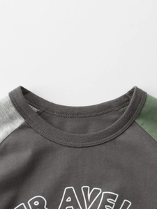 Kids cotton colorblock raglan sleeve T-shirt with Travel print and green accent