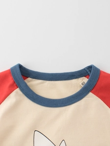 Kids cotton raglan t-shirt in beige and red with a blue ribbed crew neck detail