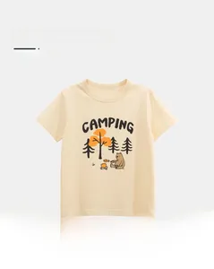 Close-up of soft cotton kids T-shirt featuring a cartoon camping bear print