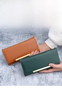 Brown and green leather long clutch wallets with elegant gold metal trim details