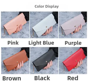 Long envelope wallets for women in six colors with gold button and chain detail