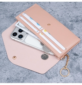 Pink faux leather long wallet detail showing internal card slots and mobile phone pocket