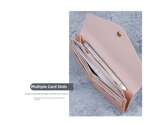 Detail view of pink long wallet showing multiple card slots and smartphone compartment