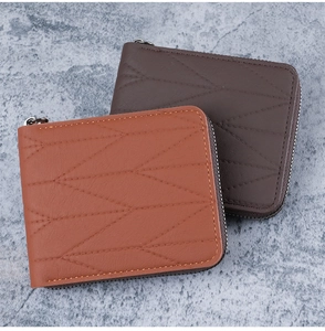 Detailed view of men's short quilted wallets in brown and coffee synthetic leather
