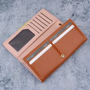 Brown leather long wallet for women with pink interior and multiple card slots