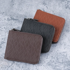 Three multi-slot zip wallets for men in brown and black with embossed leaf texture