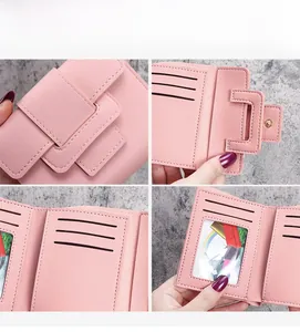 Detailed interior of a pink multi-slot short wallet with card slots and photo window