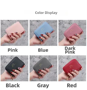 Color display of cat themed accordion card wallets with golden zipper in six vibrant colors