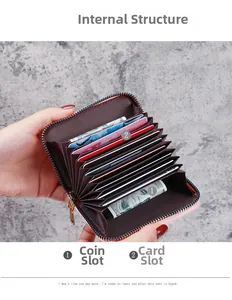 Internal view of pink leather accordion card holder with multi-slot structure and coin pouch