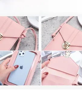 Pink PU leather crossbody phone bag featuring a touch screen window and gold buckle detail