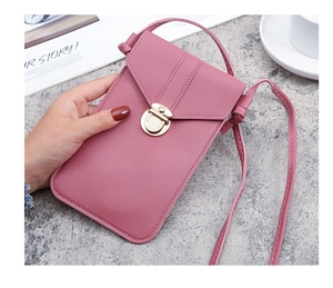 Pink faux leather crossbody phone bag featuring a round metal buckle and slim strap