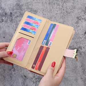 Women's pink long wallet with leaf hollow design and multi-slot interior organizer