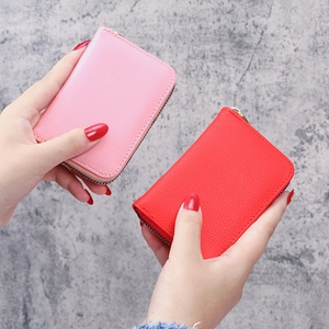 Litchi pattern accordion card wallet in pink and red with secure metal zipper closure