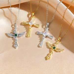 Chic gold and silver cross necklaces with snake motif and emerald zircon on silk