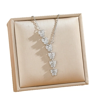 Elegant butterfly tassel necklace in titanium steel with white cubic zirconia pavé setting