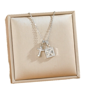 Elegant titanium steel necklace with sparkling diamond cross and floral square pendants