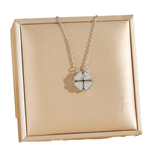 Convertible silver four-leaf clover necklace with heart folding magnets and pavé zircons