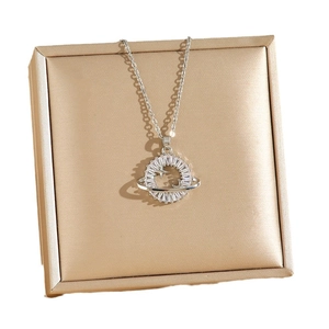 Titanium steel planet pendant necklace with zircon starry moon design on gold display