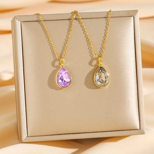 Elegant gold titanium necklace featuring purple and champagne water drop crystal pendants