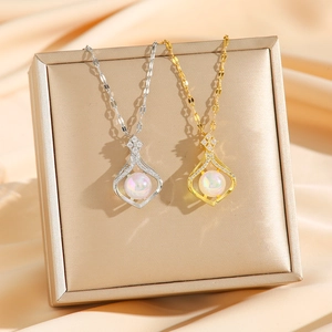 Titanium steel waterdrop necklaces in gold and silver with iridescent pearls