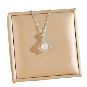 Titanium waterdrop pearl necklace with pavé zircon setting in a luxury gold gift box
