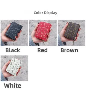 Vue détaillée des porte-cartes compacts zippés en cuir noir, rouge, marron et blanc élégant