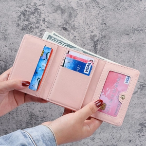 Pink tri-fold PU leather wallet for women featuring multiple card slots and snap button