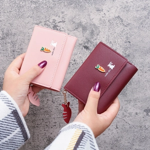 Cute tri-fold women's mini wallet in pink and burgundy with rabbit design