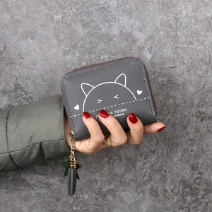 Short grey zip-around wallet with cute cat print and tassel star charm for women