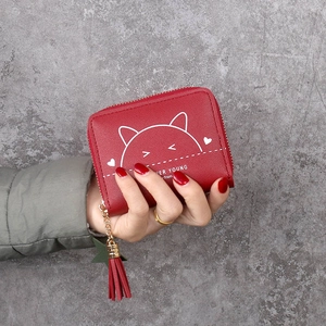 Compact red leather wallet for women with cute cat print and stylish tassel zipper charm