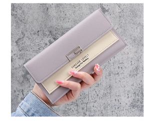 Detailed view of trifold long wallet featuring lavender PU leather and metal buckle