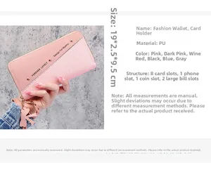Detail view of pink glitter long wallet with dimensions 19x2.5x9.5cm and multi-slot interior