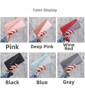 Color options of long patchwork wallets with glitter finish and tassel charms