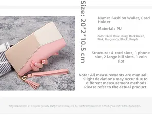 Detail view of pink and beige patchwork wallet interior with multiple card and phone slots