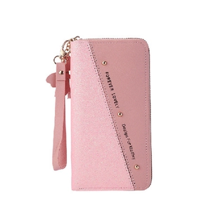 Women long zipper wallet in pink patchwork with sequin detail and angel pendant charm