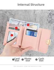 Pink trifold wallet with pebble leather texture showing card slots and cash pocket