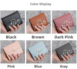 Selection of compact women's PU leather wallets featuring cherry blossom print and metal buckle