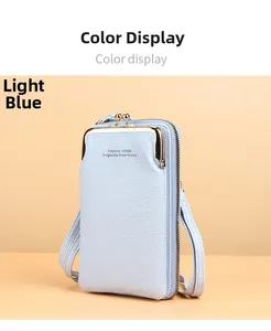 Detail of light blue lychee pattern leather wallet with dual zipper and adjustable strap