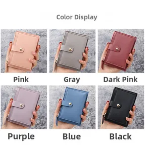 Detailed close-up of slim leather card holders with snap button and side zipper in six colors