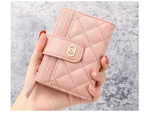 Pink quilted faux leather short wallet with golden ring buckle and zipper detail