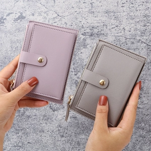 Slim women's card holder in litchi grain PU leather with zipper pocket and snap closure