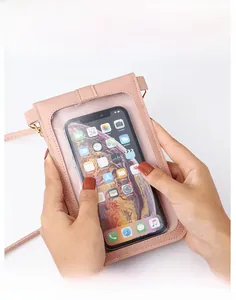 Close-up of pink PU leather crossbody bag featuring a highly transparent touch-screen window