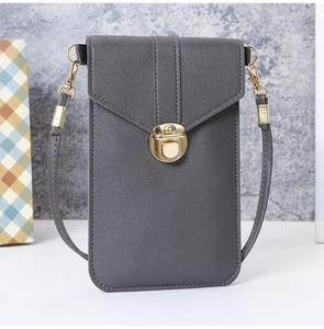 Detail of grey PU leather crossbody phone bag featuring a gold metal buckle and flap
