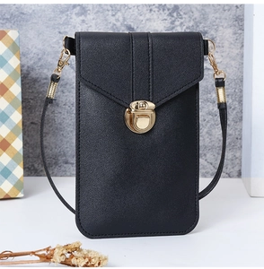 Detail view of black lychee grain PU leather phone bag with round gold metal twist lock