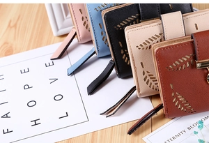 Detail of short wallets for women featuring leaf hollow design in five vibrant colors