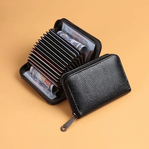 Porte-cartes en cuir litchi noir avec protection RFID et fermeture éclair sécurisée