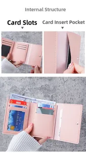 Detail of pink tri-fold wallet showing multiple card slots and cash compartment