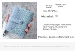 Detail of mint green crocodile pattern wallet showing dimensions 11.5x2x9cm and texture